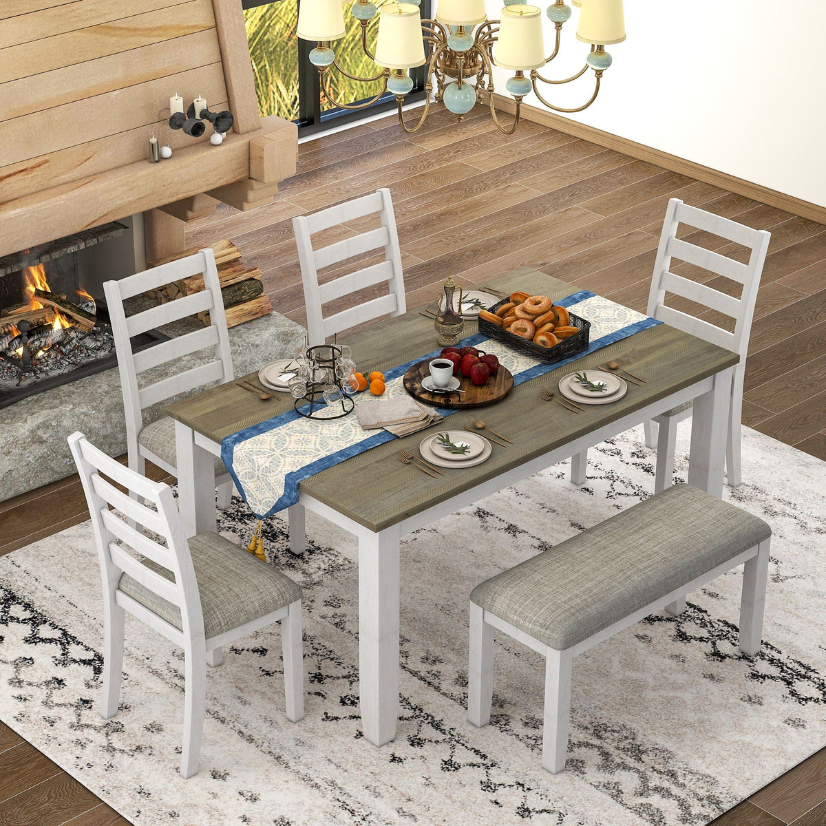 Overhead view of the brown and whitewash dining set with four ladder-back chairs and a cushioned bench