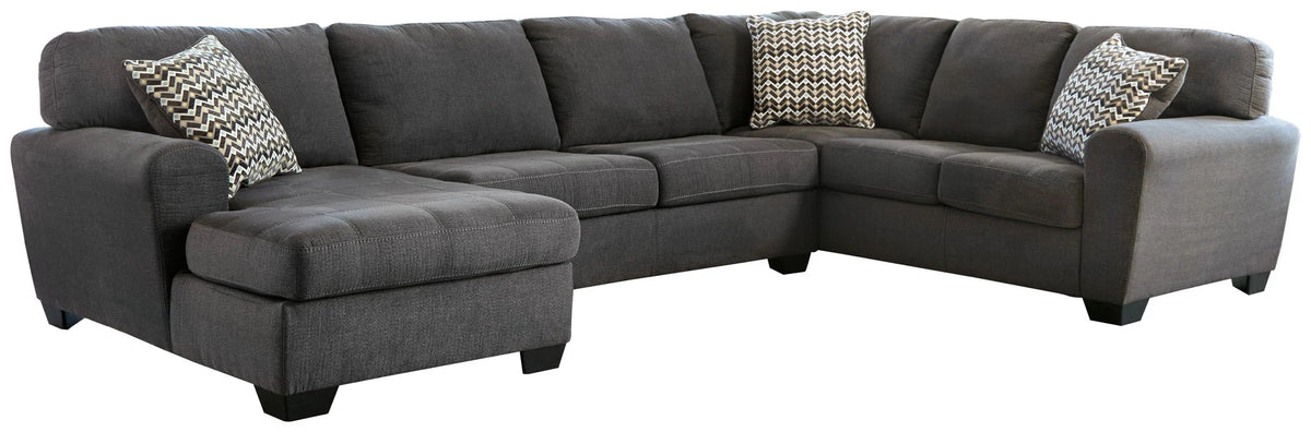 Slate gray three-piece sectional with corner chaise and patterned accent pillows