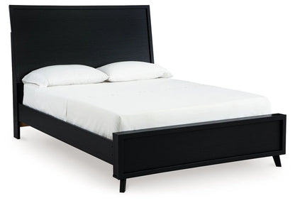 Black Danziar panel bed with matte woodgrain texture