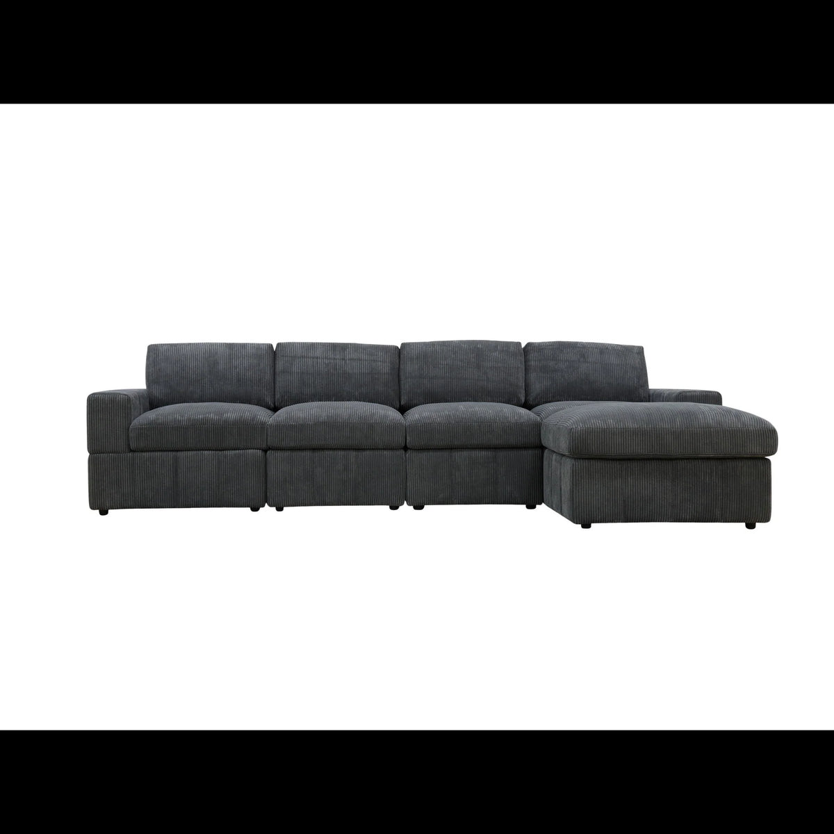 Front view of a dark gray modular sofa with an ottoman arranged as a chaise on the right