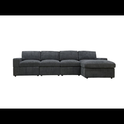 Front view of a dark gray modular sofa with an ottoman arranged as a chaise on the right