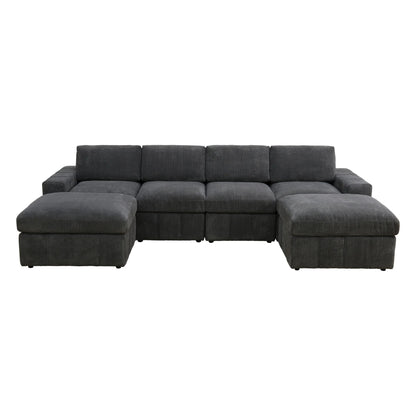 Dark gray modular sofa with matching ottomans at both ends on a white background