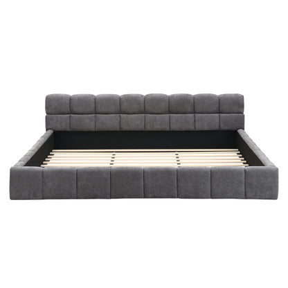Gray fabric upholstered bed with checkerboard headboard