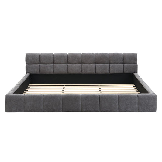 Gray fabric upholstered bed with checkerboard headboard