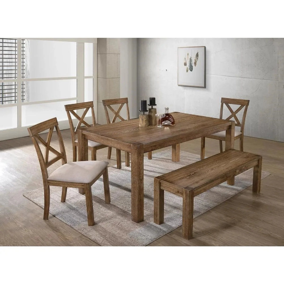 Antique oak dining table with four cushioned X-back chairs and a bench in a dining room