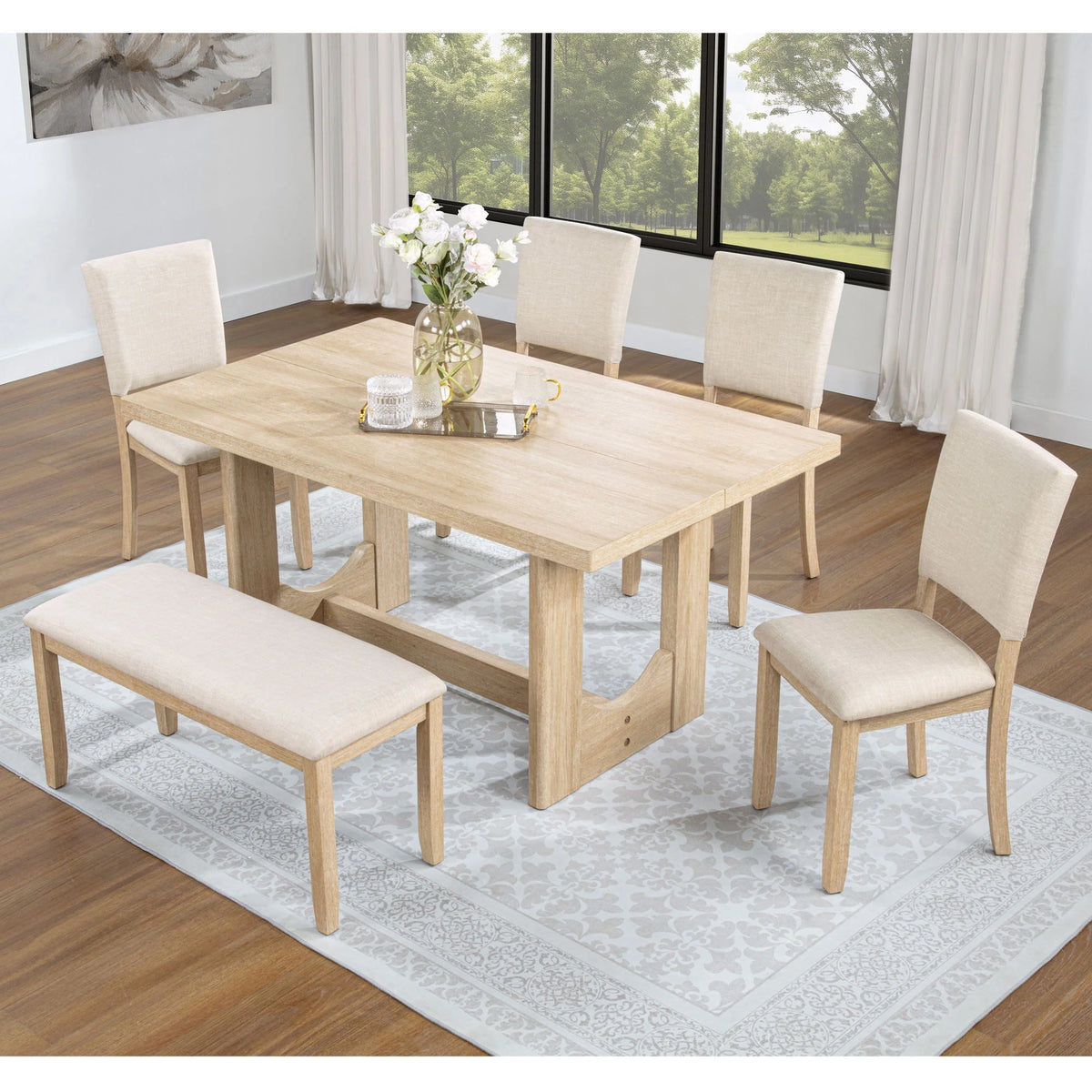 Overhead view of the light oak trestle dining set with four upholstered chairs and a bench